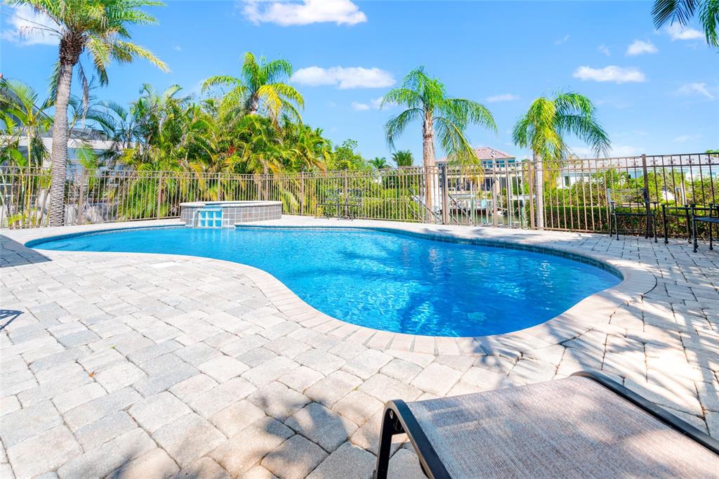 6315 Marbella Boulevard Apollo Beach, FL 33572 - Photo 53 of 83 a view of a swimming pool with an outdoor space