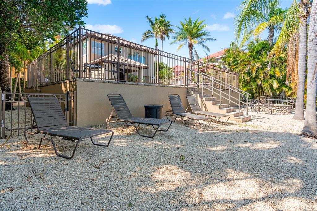 6315 Marbella Boulevard Apollo Beach, FL 33572 - Photo 57 of 83 a view of a house with backyard sitting area and tub