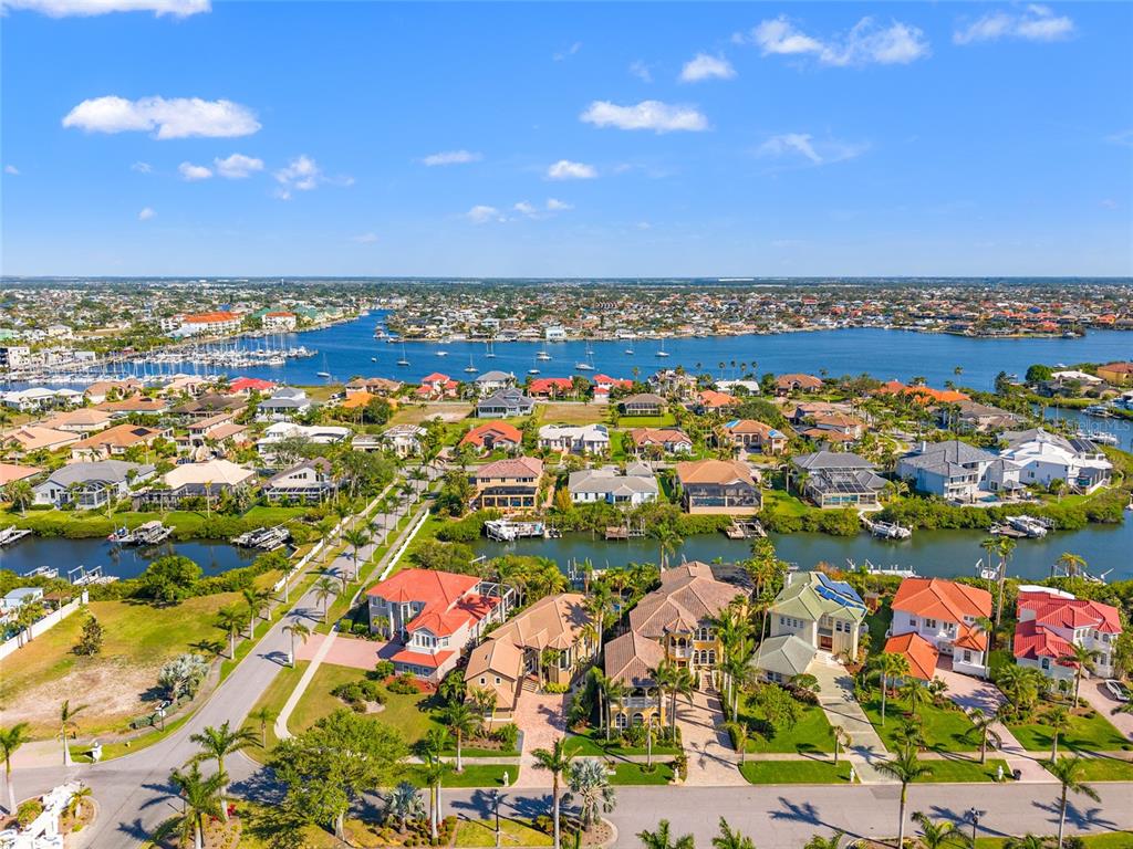 6315 Marbella Boulevard Apollo Beach, FL 33572 - Photo 70 of 83 an aerial view of residential houses with outdoor space and trees