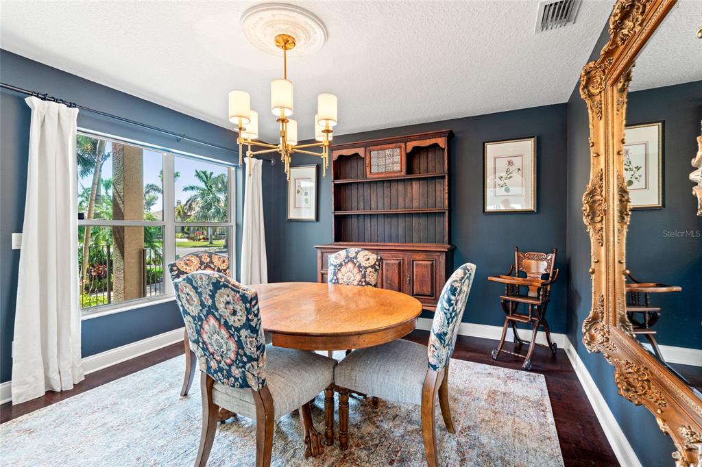 6315 Marbella Boulevard Apollo Beach, FL 33572 - Photo 7 of 83 a view of a dining room with furniture window and outside view