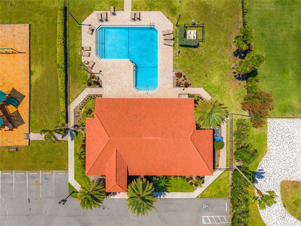 6315 Marbella Boulevard Apollo Beach, FL 33572 - Photo 76 of 83 aerial view of a house with a yard and sitting area