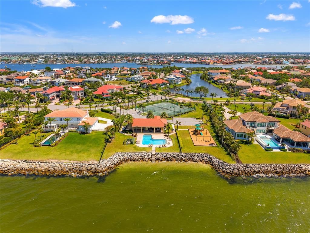 6315 Marbella Boulevard Apollo Beach, FL 33572 - Photo 79 of 83 an aerial view of residential houses with outdoor space and swimming pool