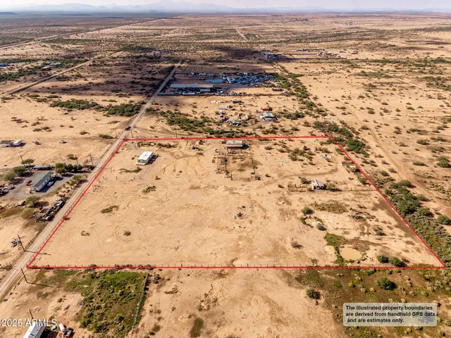 an aerial view of residential building and ocean