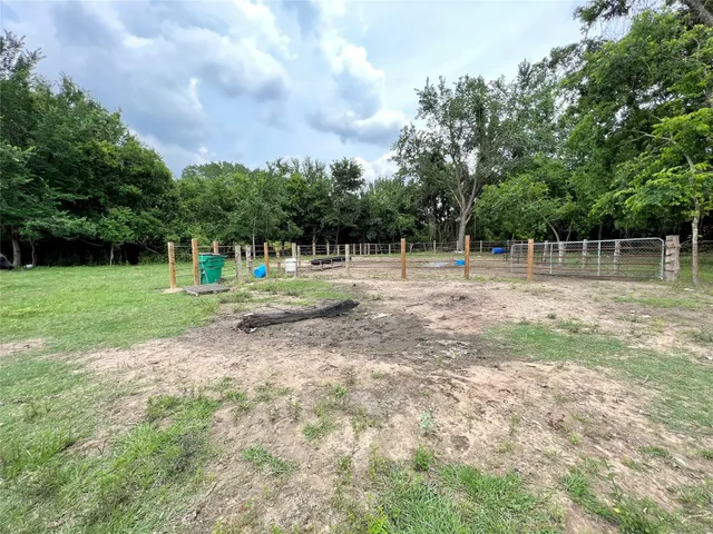 a view of backyard with green space
