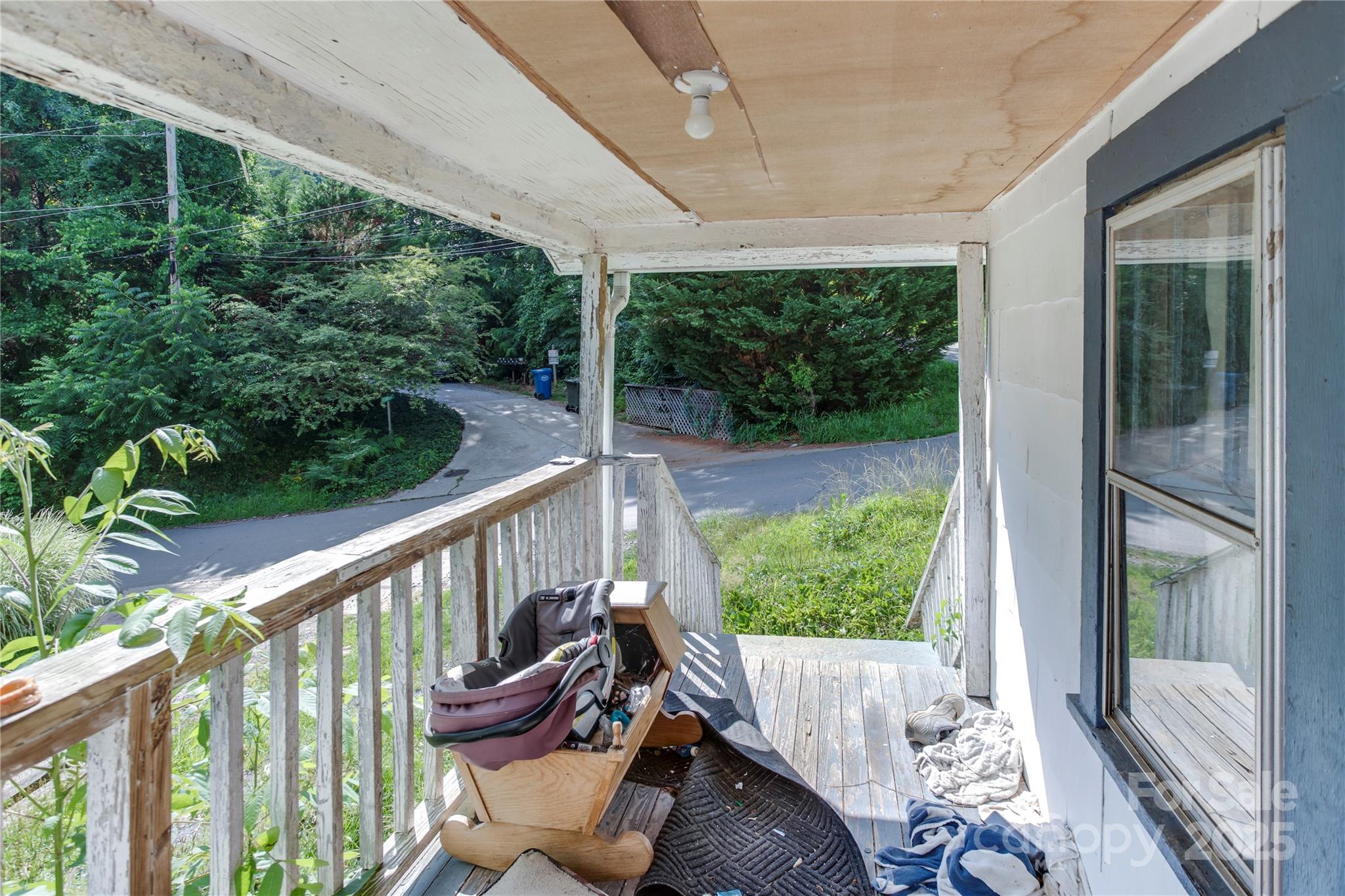 401 Ray Street Waynesville, NC 28786 - Photo 6 of 10 a view of a two chair in the balcony