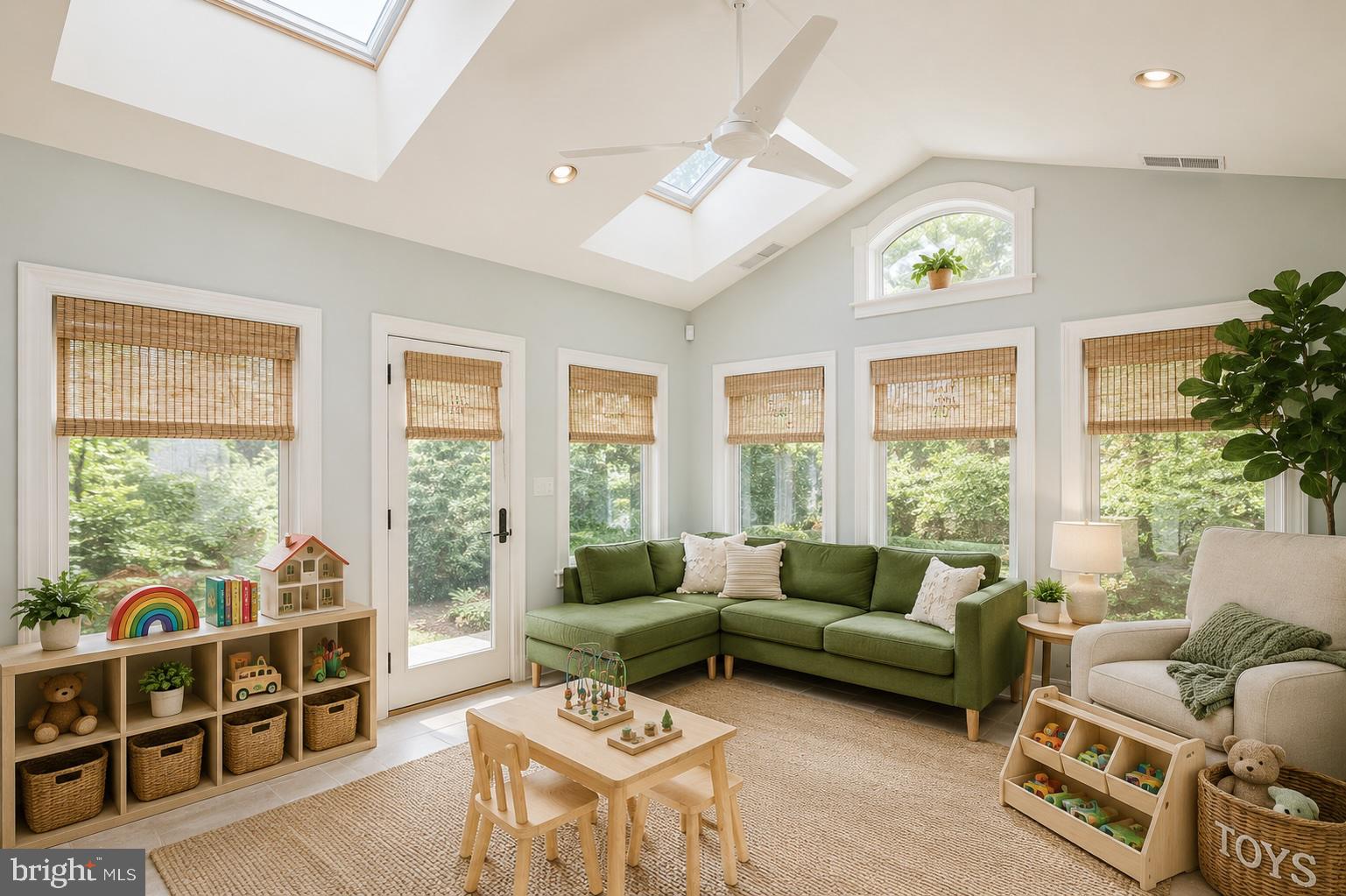 7906 Long Meadow Road Pikesville, MD 21208 - Photo 4 of 30 Bright and airy playroom retreat.
