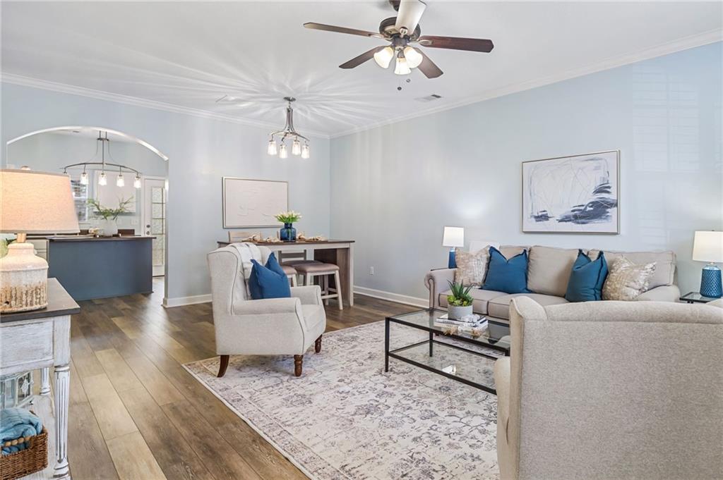 2159 Del Lago Circle Kennesaw, GA 30152 - Photo 1 of 1 a living room with furniture and a wooden floor