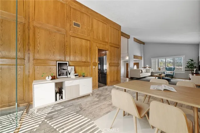 a bedroom with a bed and a chair