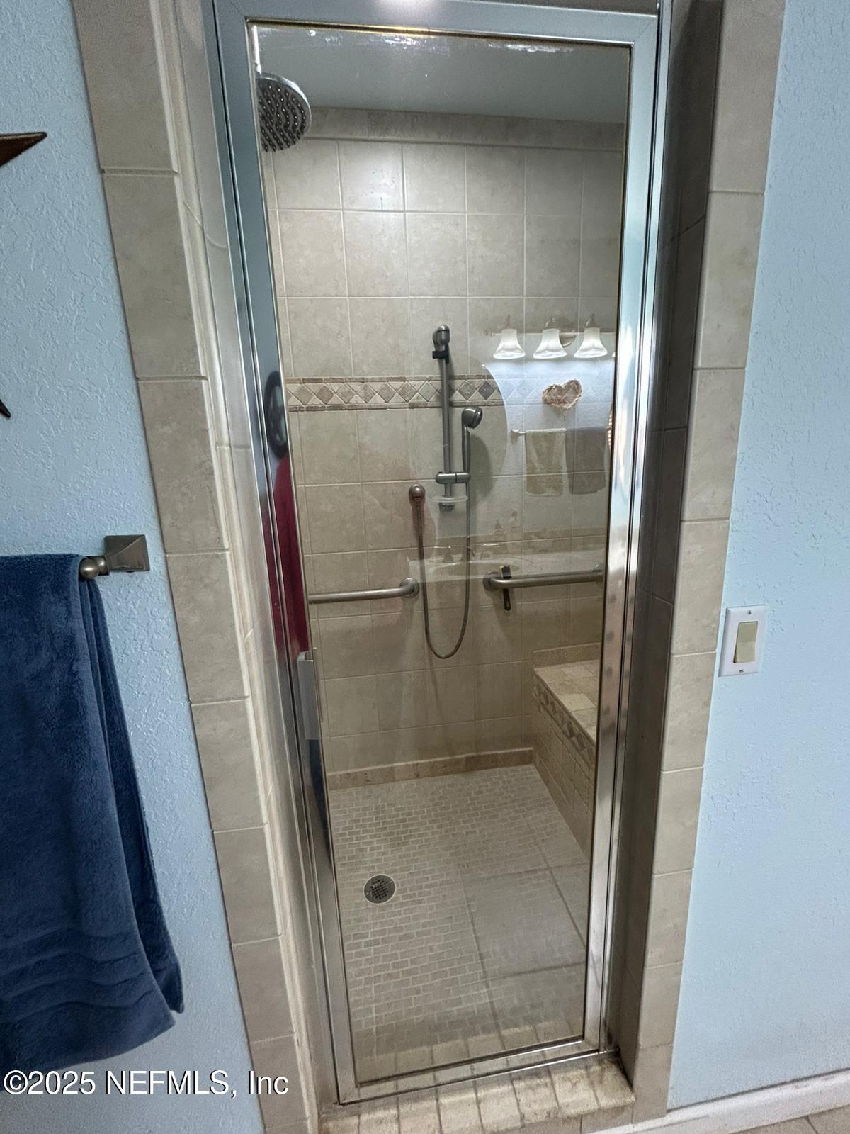 5377 Southwest 40th Avenue Jasper, FL 32052 - Photo 11 of 86 a bathroom with a glass door shower