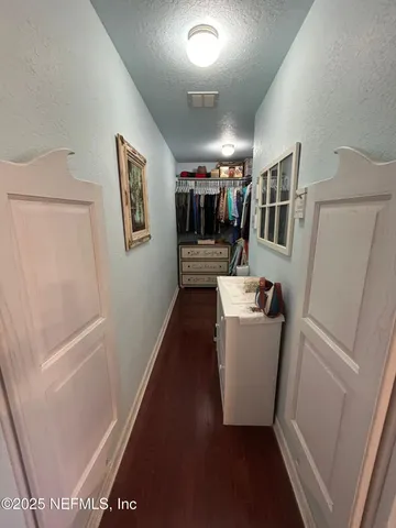 a bathroom with a toilet and a sink