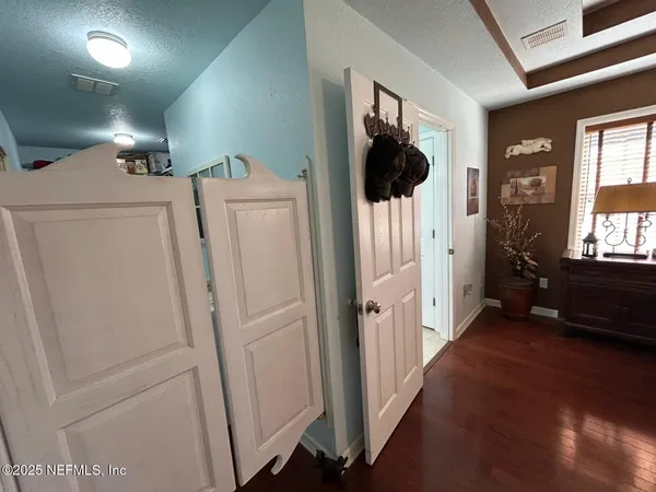 a bathroom with a glass door shower