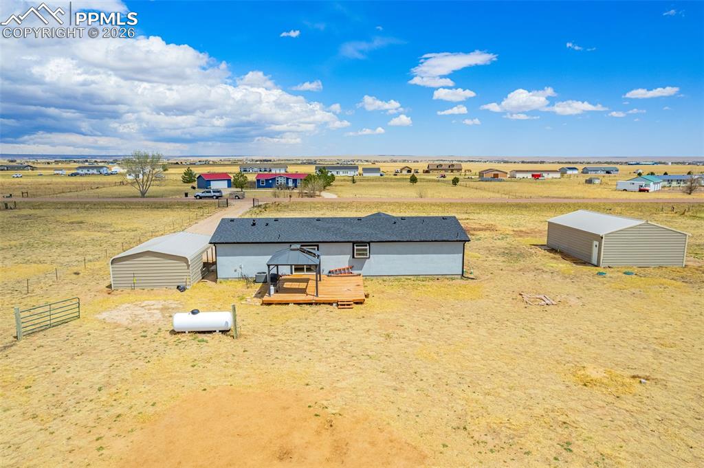 1134 Buffalo Run Road Calhan, CO 80808 - Photo 3 of 35 swimming pool view with a lake view