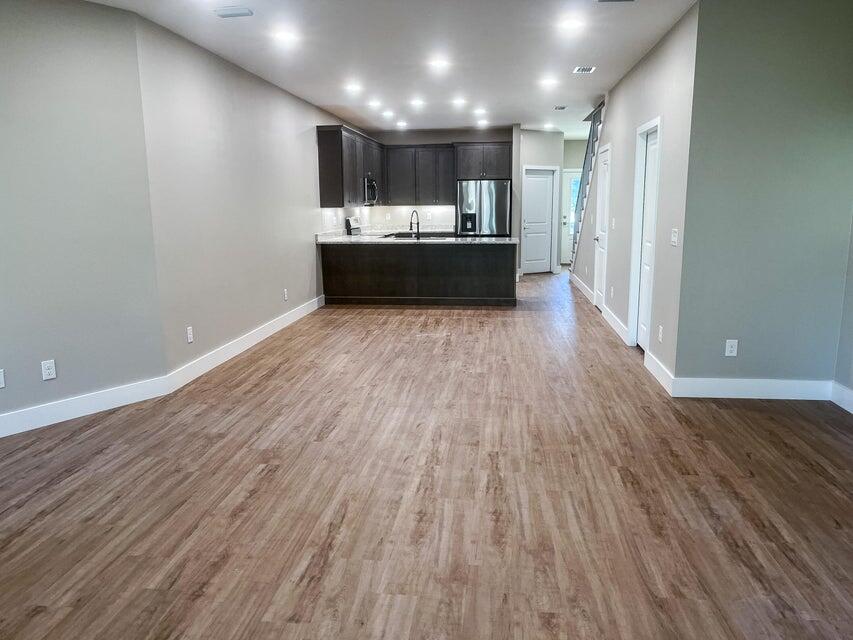 2879 Leahs Lane Navarre, FL 32566 - Photo 5 of 13 a view of kitchen and wooden floor