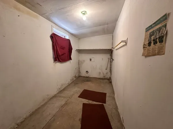 a view of a hallway with entryway