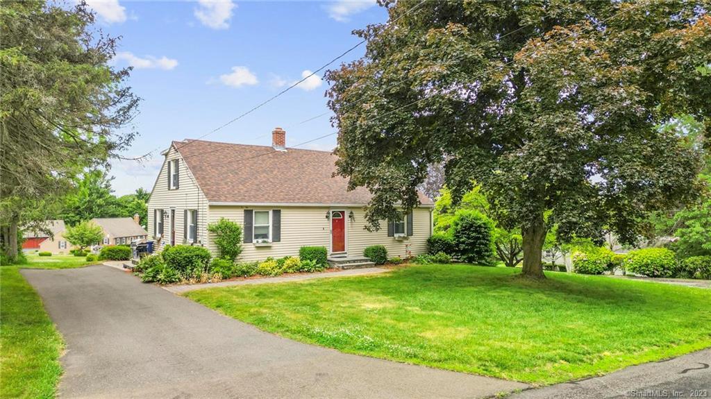 109 Meeting House Hill Road Durham, CT 06422 - Photo 1 of 1 a front view of house with yard and green space