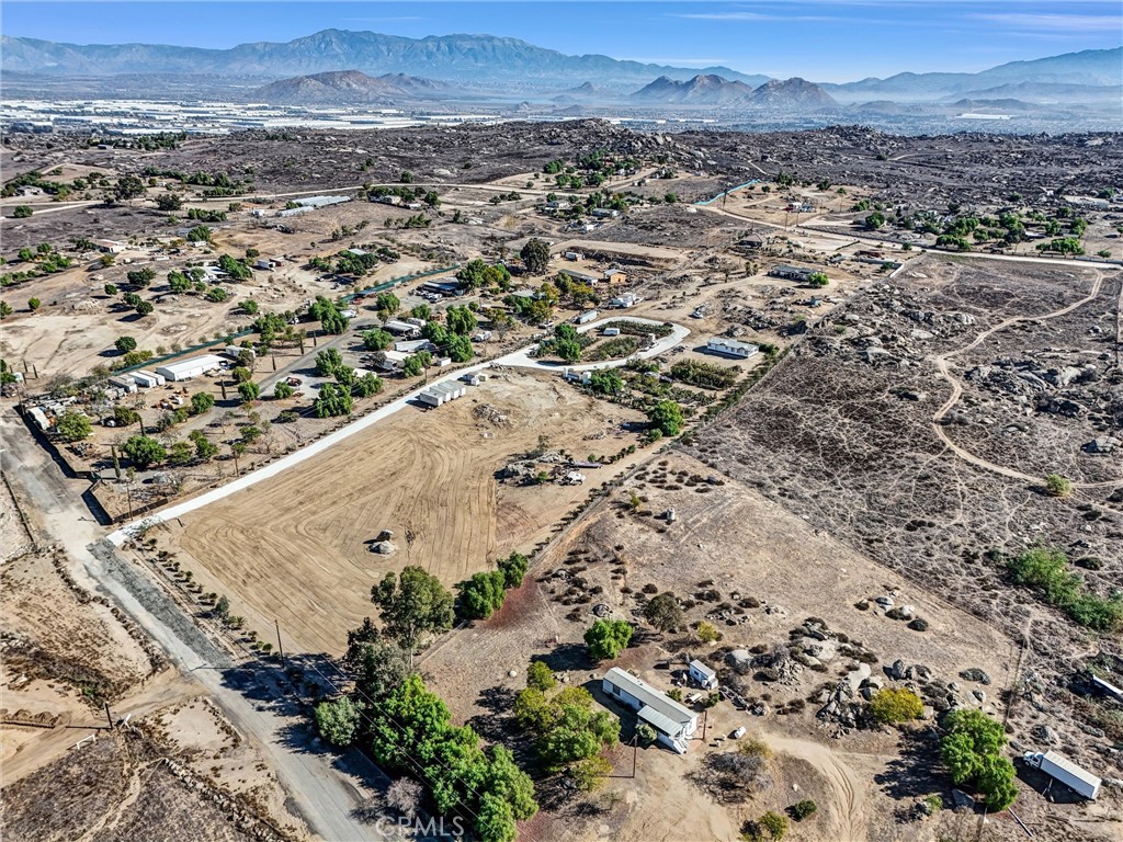 21720 Yucca Road Perris, CA 92570 - Photo 47 of 58 an aerial view of a house with a yard