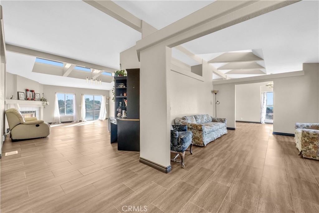 21720 Yucca Road Perris, CA 92570 - Photo 4 of 58 a living room with furniture and a wooden floor