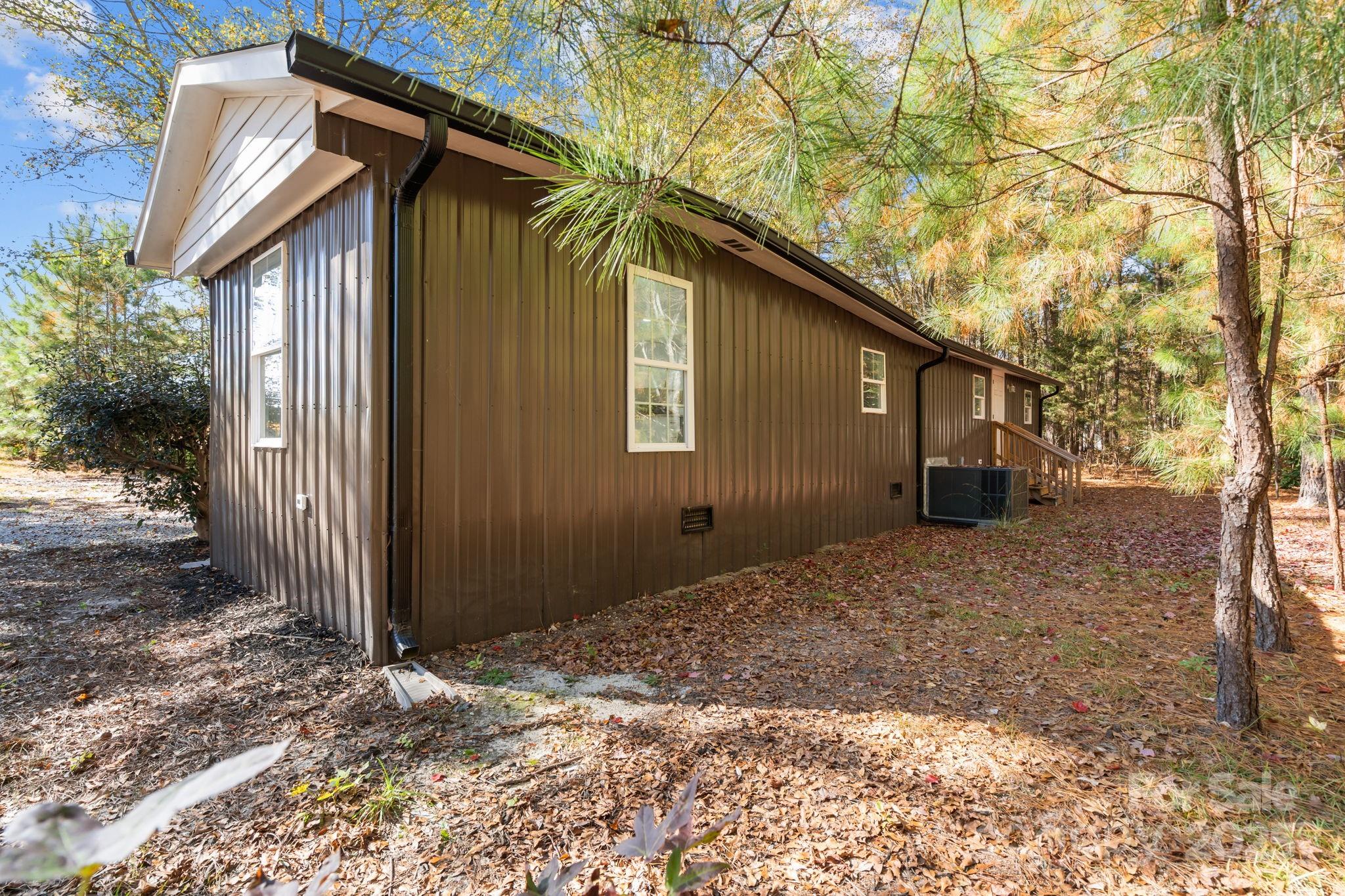 2627 McCallum Road Candor, NC 27229 - Photo 38 of 41 a backyard of a house