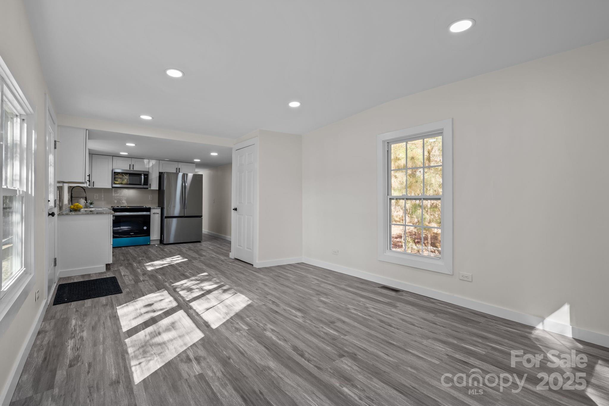 2627 McCallum Road Candor, NC 27229 - Photo 7 of 41 a view of kitchen with furniture and window