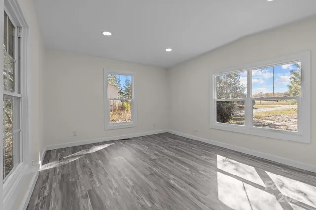 a view of an empty room and window