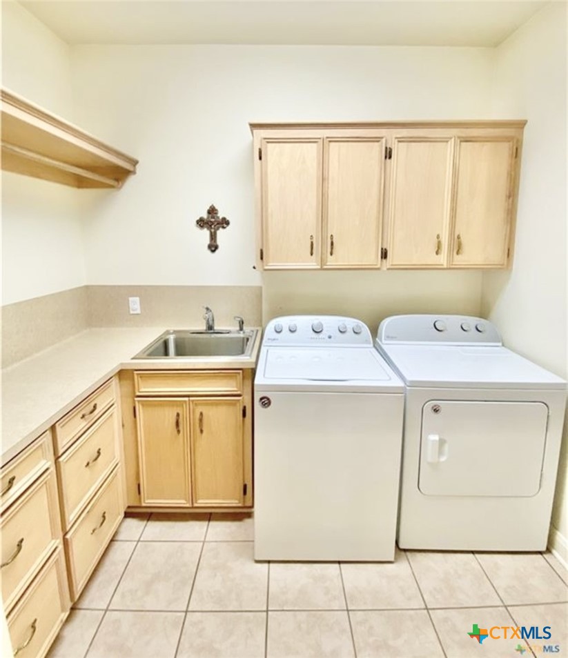 415 South Trinity Street Edna, TX 77957 - Photo 37 of 46 a utility room with dryer and washer