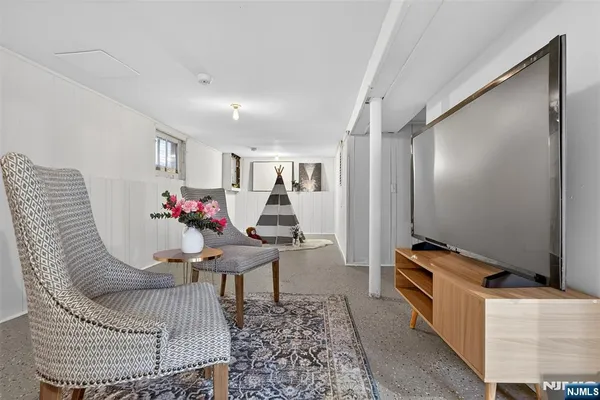 a living room with furniture and a table