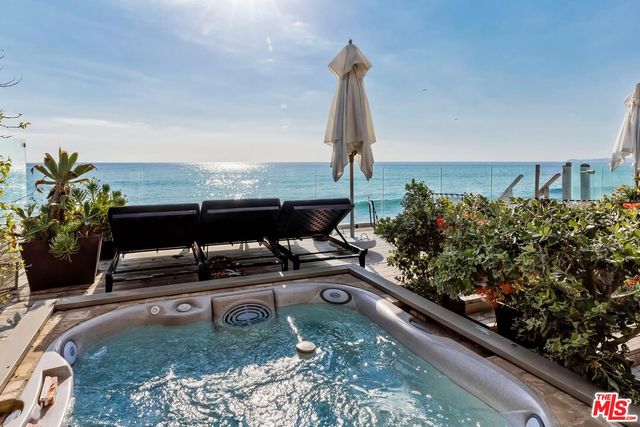 a view of a lake with a sitting space