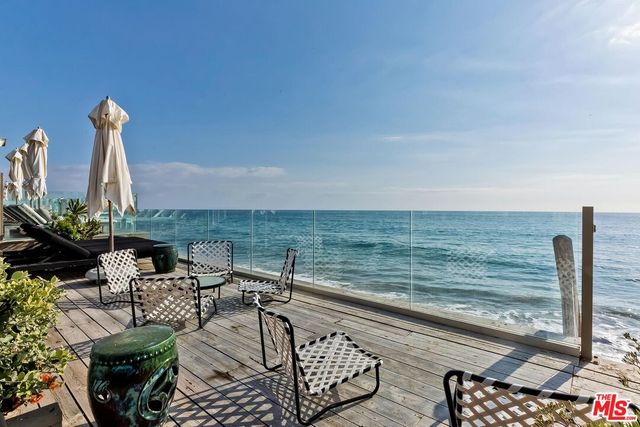 a view of a terrace with chairs