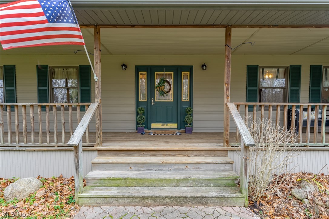 IMPRESSIVE ENTRY FROM WRAP-AROUND PORCH