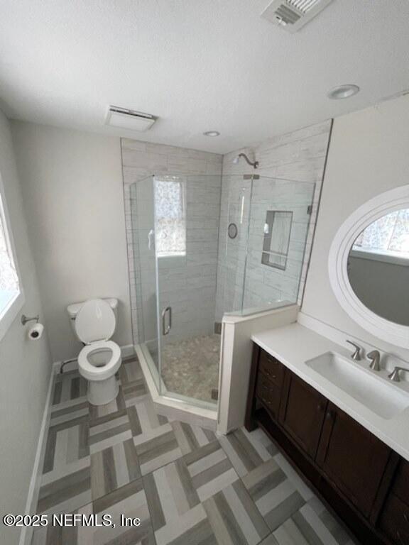 14014 Lem Turner Road Jacksonville, FL 32218 - Photo 24 of 25 a bathroom with a sink mirror vanity and toilet