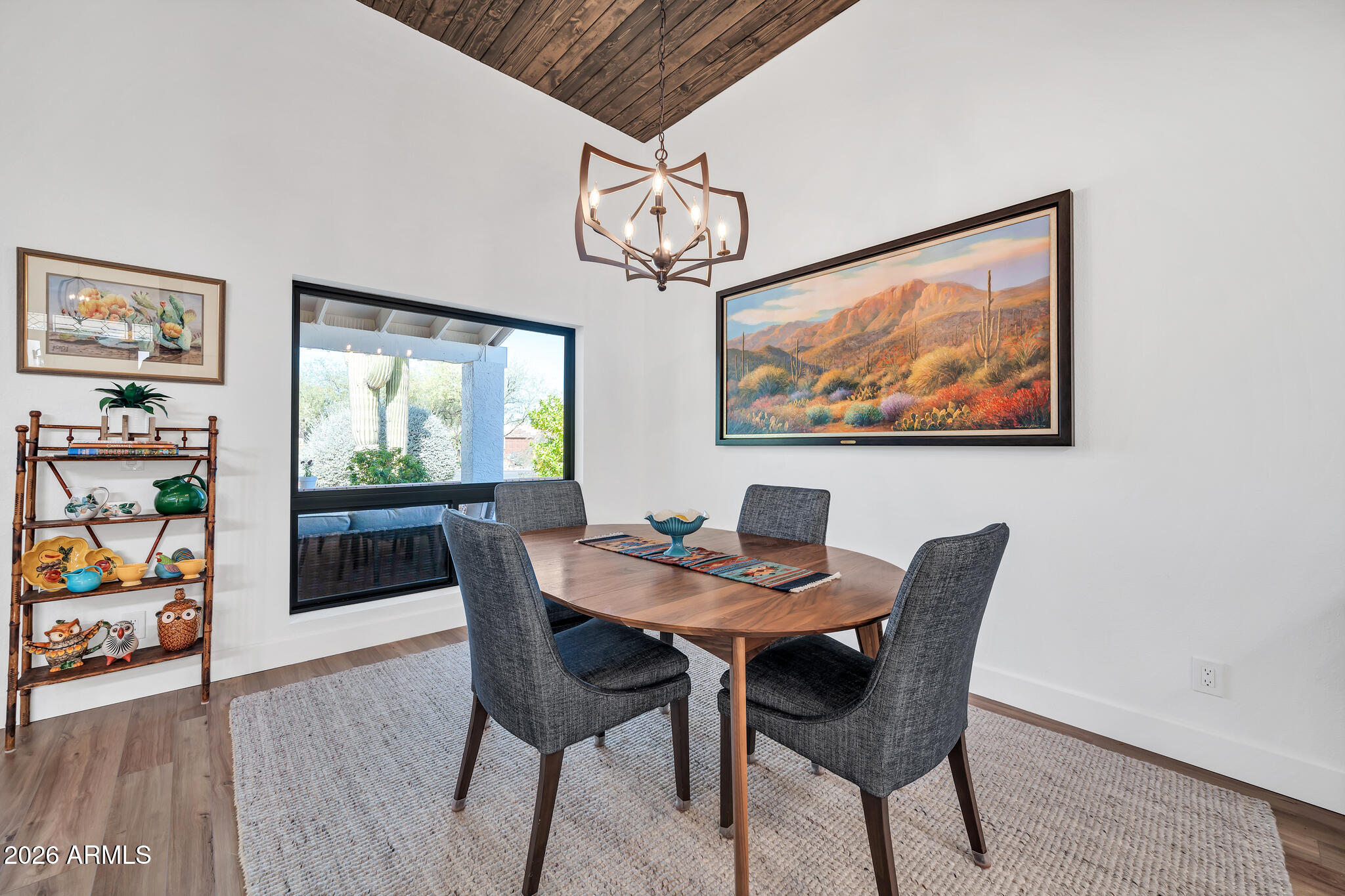 26229 East Marquis Lane Rio Verde, AZ 85263 - Photo 12 of 50 a view of a dining room with furniture wooden floor and window