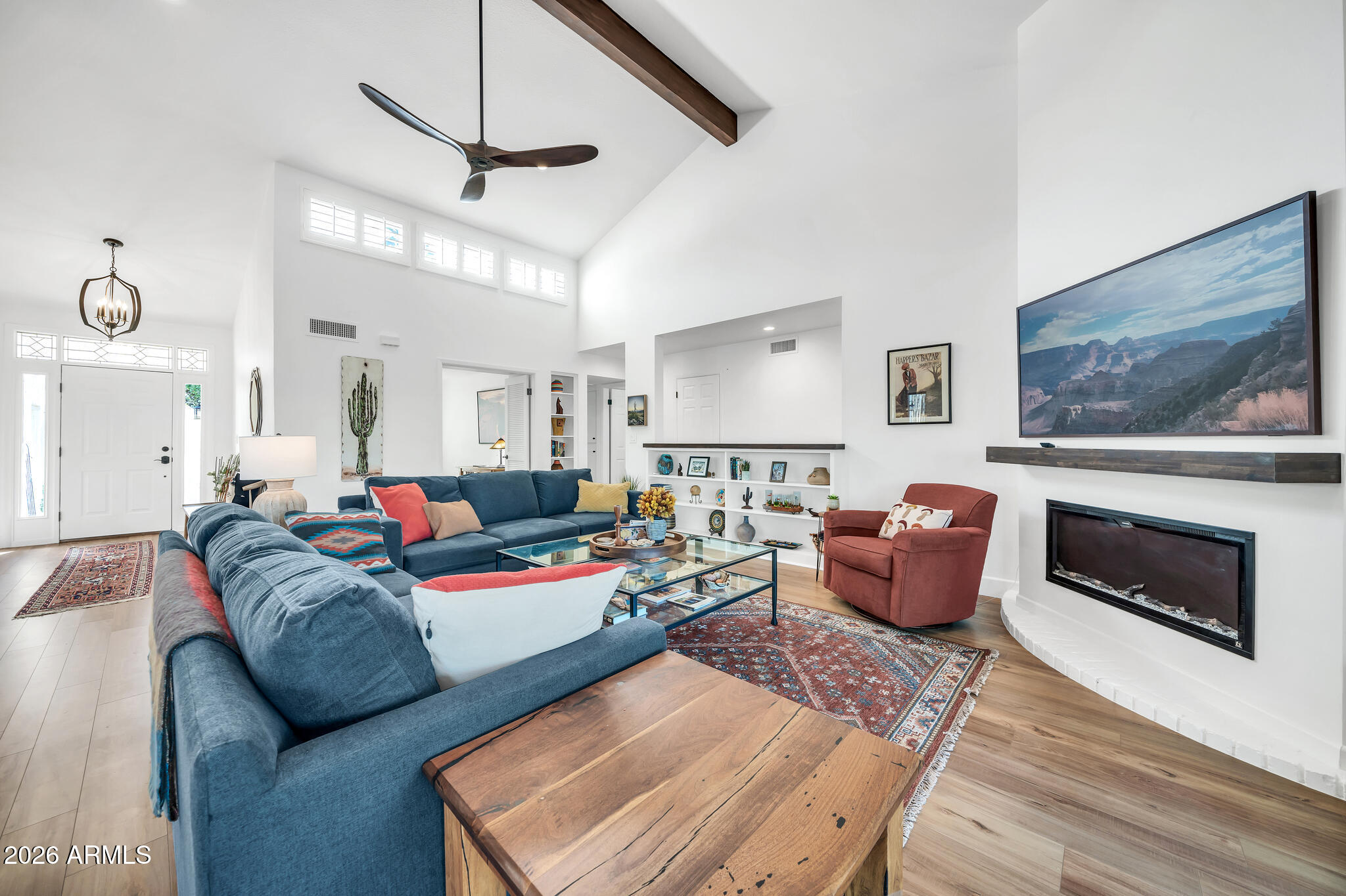 26229 East Marquis Lane Rio Verde, AZ 85263 - Photo 14 of 50 a living room with furniture or couch and a fireplace