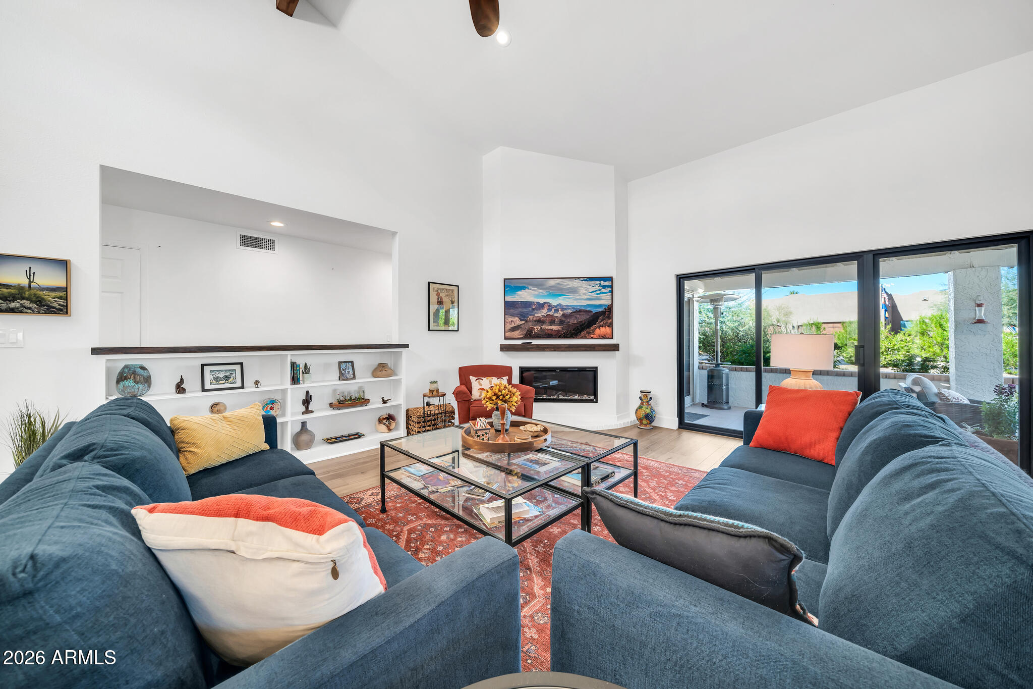26229 East Marquis Lane Rio Verde, AZ 85263 - Photo 16 of 50 a living room with furniture and a large window
