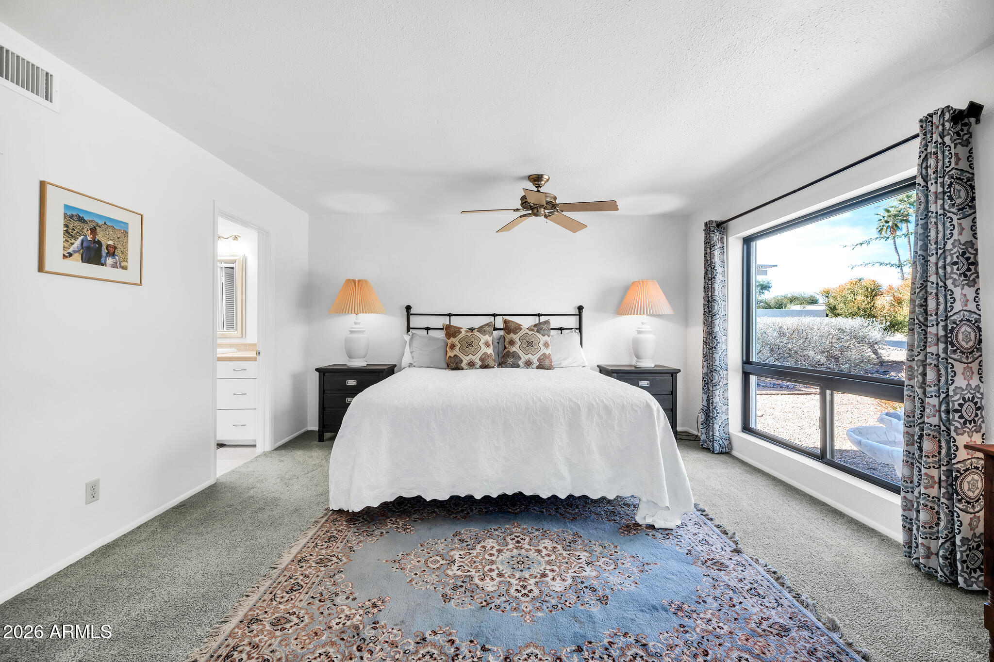 26229 East Marquis Lane Rio Verde, AZ 85263 - Photo 28 of 50 a bedroom with a bed and window