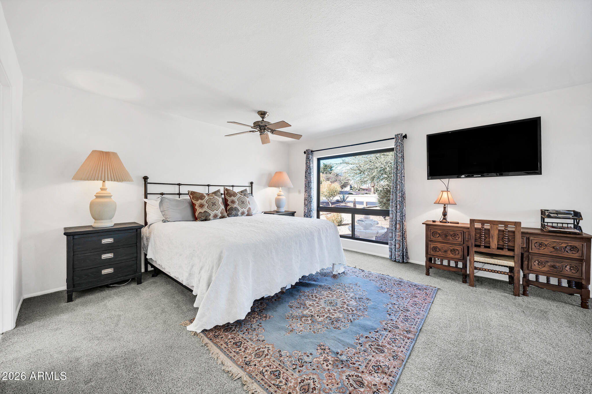 26229 East Marquis Lane Rio Verde, AZ 85263 - Photo 29 of 50 a bedroom with a bed and a flat screen television