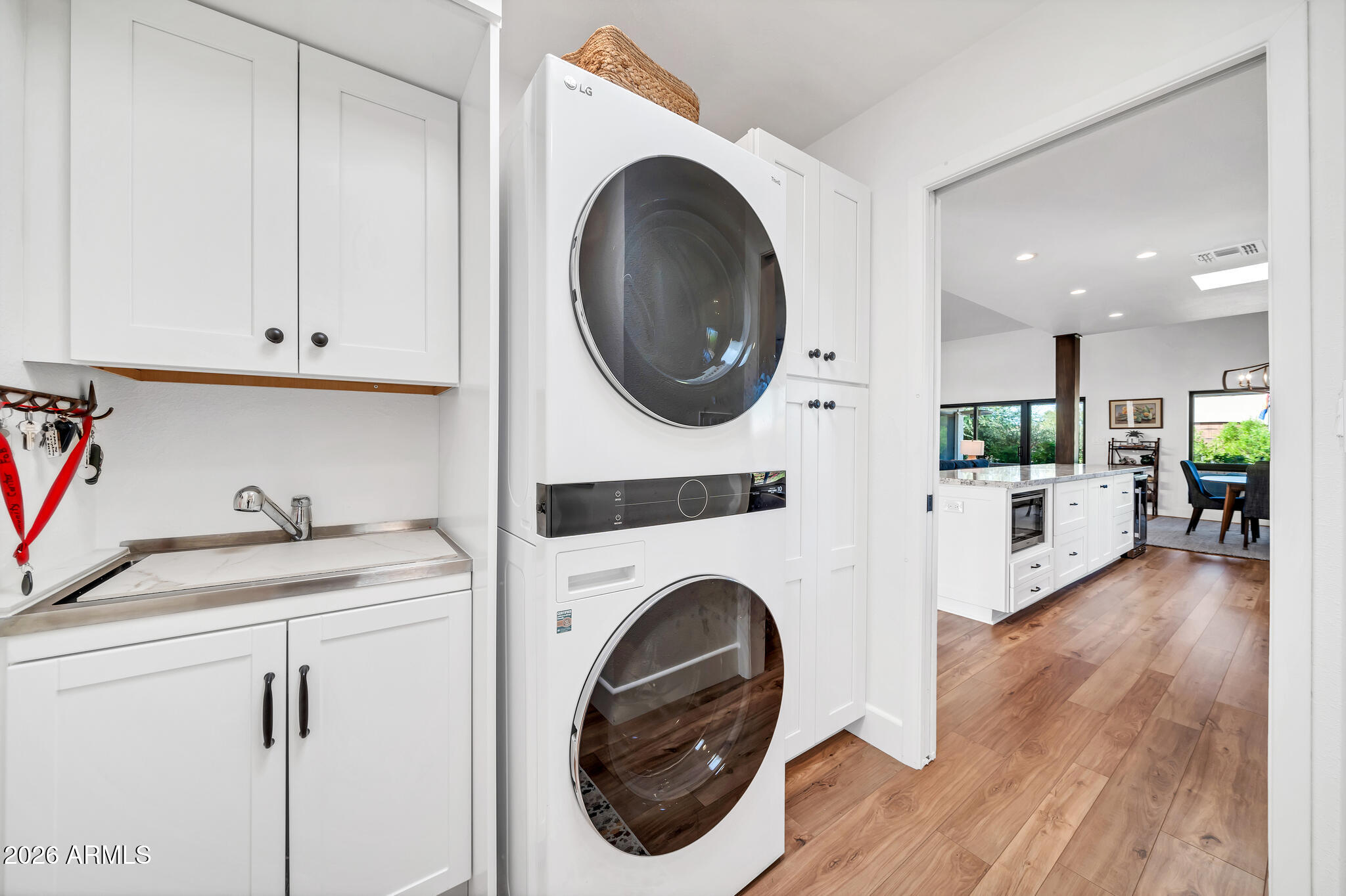 26229 East Marquis Lane Rio Verde, AZ 85263 - Photo 30 of 50 a view of a kitchen with washer and dryer