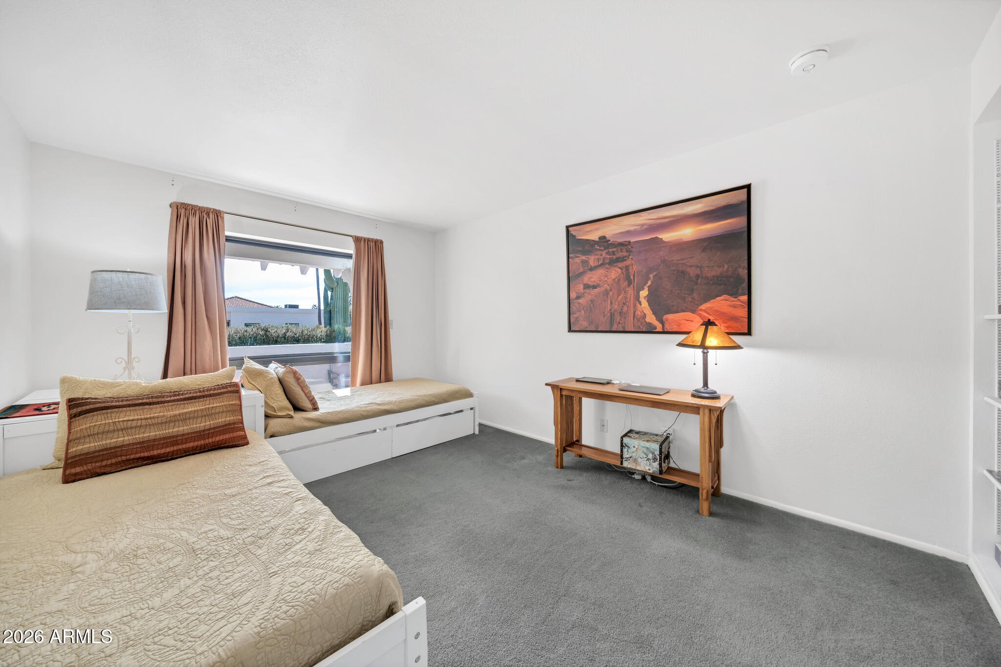 26229 East Marquis Lane Rio Verde, AZ 85263 - Photo 34 of 50 a bedroom with furniture and a window
