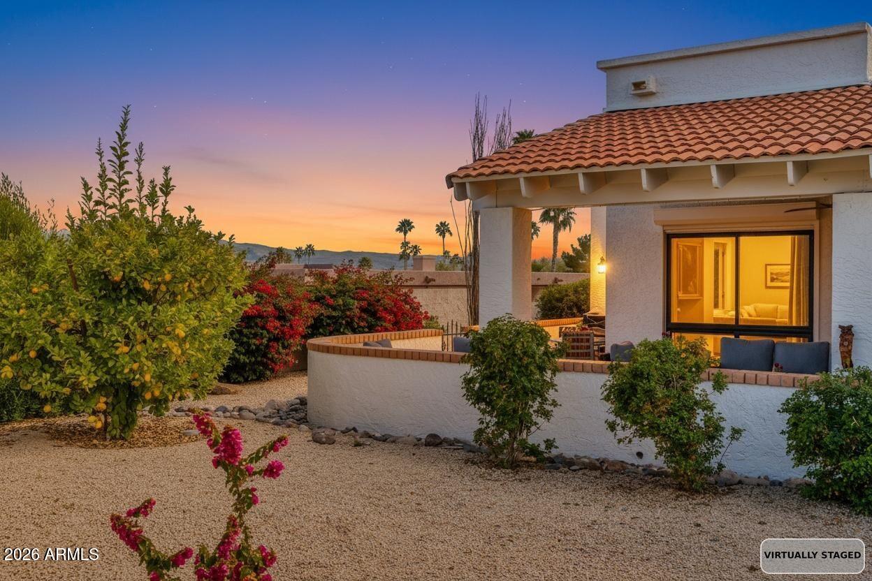 26229 East Marquis Lane Rio Verde, AZ 85263 - Photo 37 of 50 a front view of a house with a yard