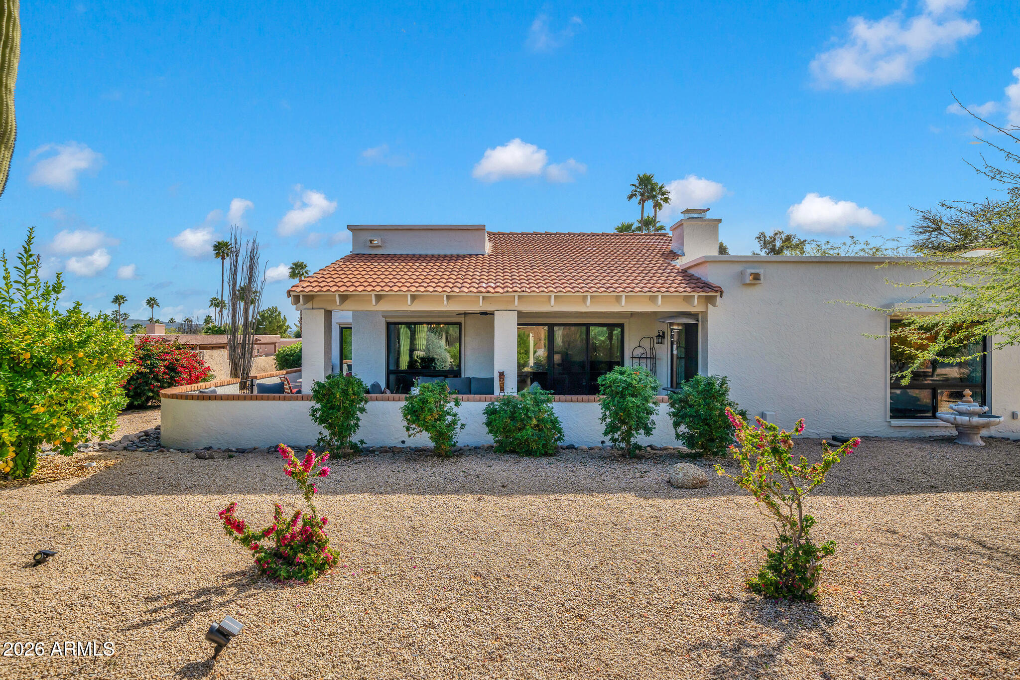 26229 East Marquis Lane Rio Verde, AZ 85263 - Photo 41 of 50 a front view of a house with a yard