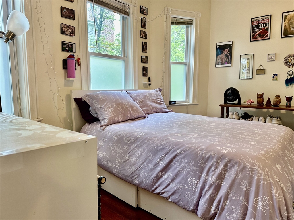 12-14 Marcella Street, Unit 2 Cambridge, MA 02141 - Photo 15 of 23 a bedroom with a bed and a window