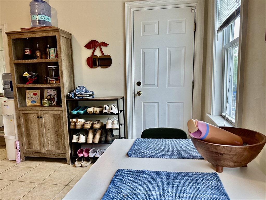 12-14 Marcella Street, Unit 2 Cambridge, MA 02141 - Photo 23 of 23 a living room with lots of furniture and a rug