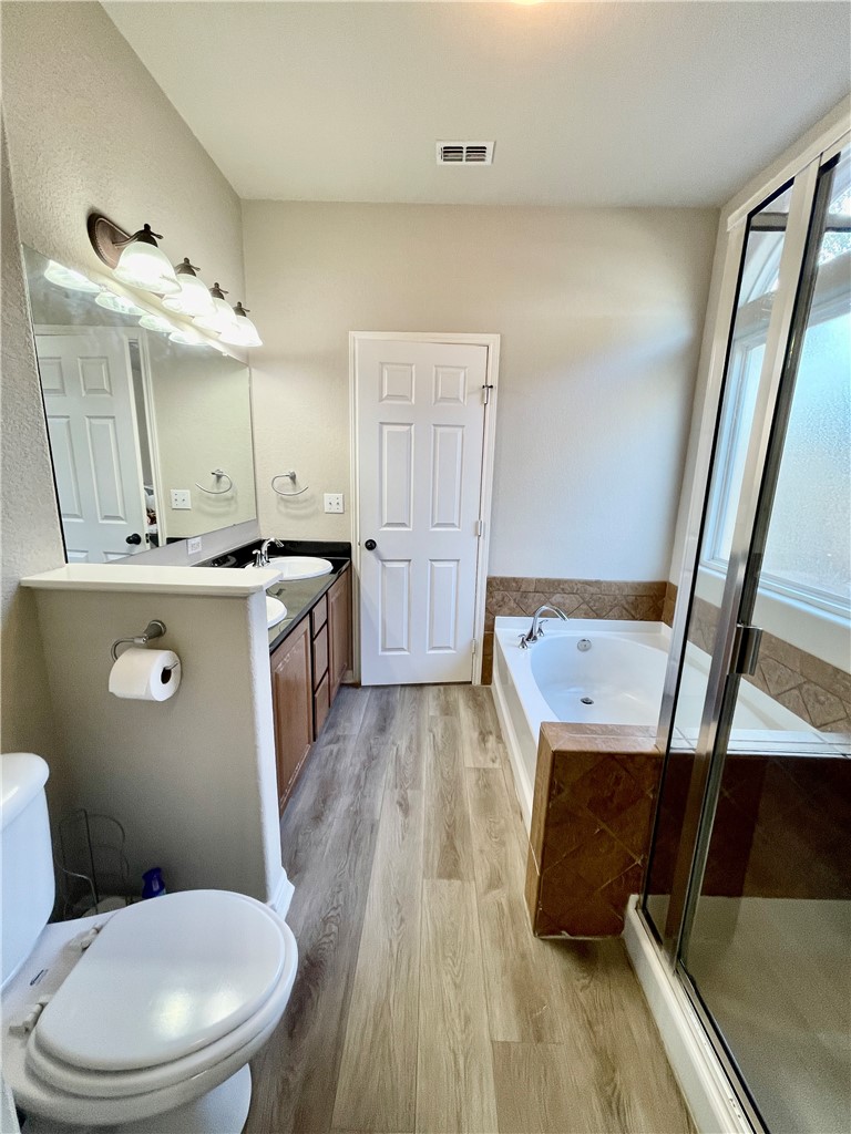 103 Sandollar Circle Fulton, TX 78382 - Photo 14 of 25 a bathroom with a sink a toilet and mirror