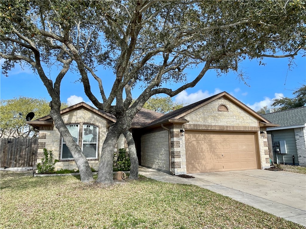 103 Sandollar Circle Fulton, TX 78382 - Photo 2 of 25 a front view of a house with a yard