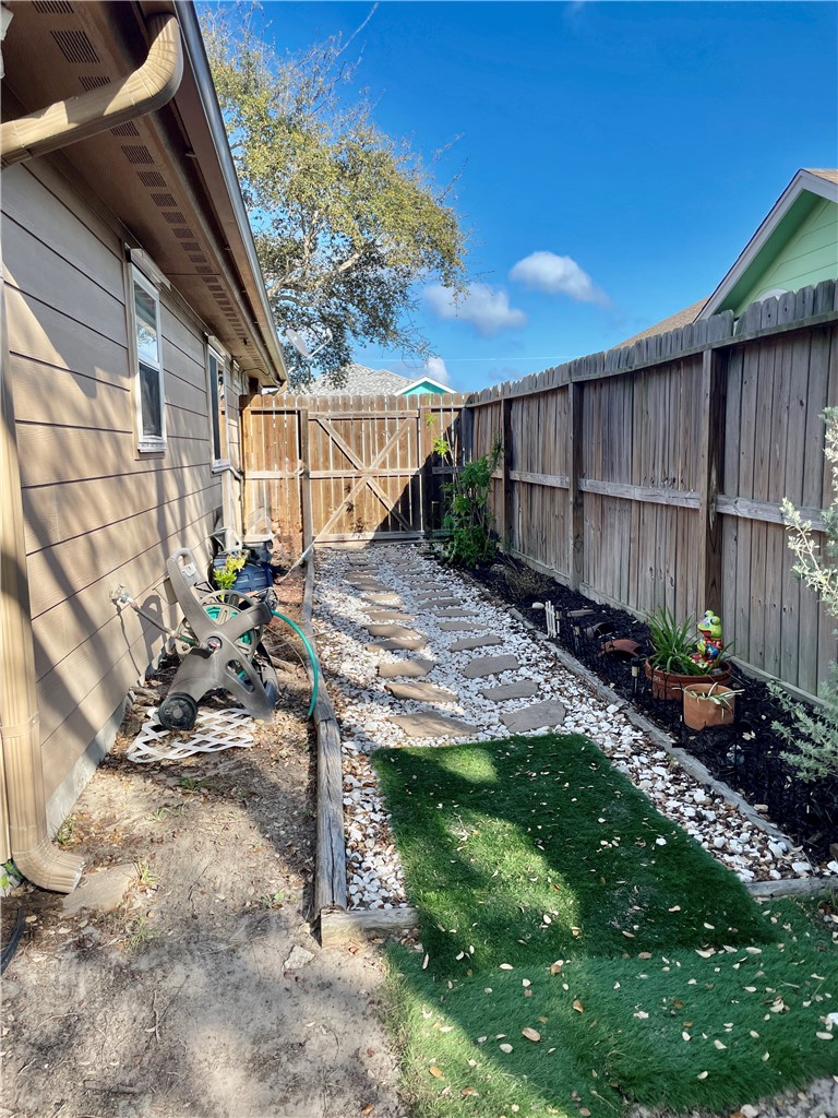 103 Sandollar Circle Fulton, TX 78382 - Photo 25 of 25 a view of a backyard with wooden fence