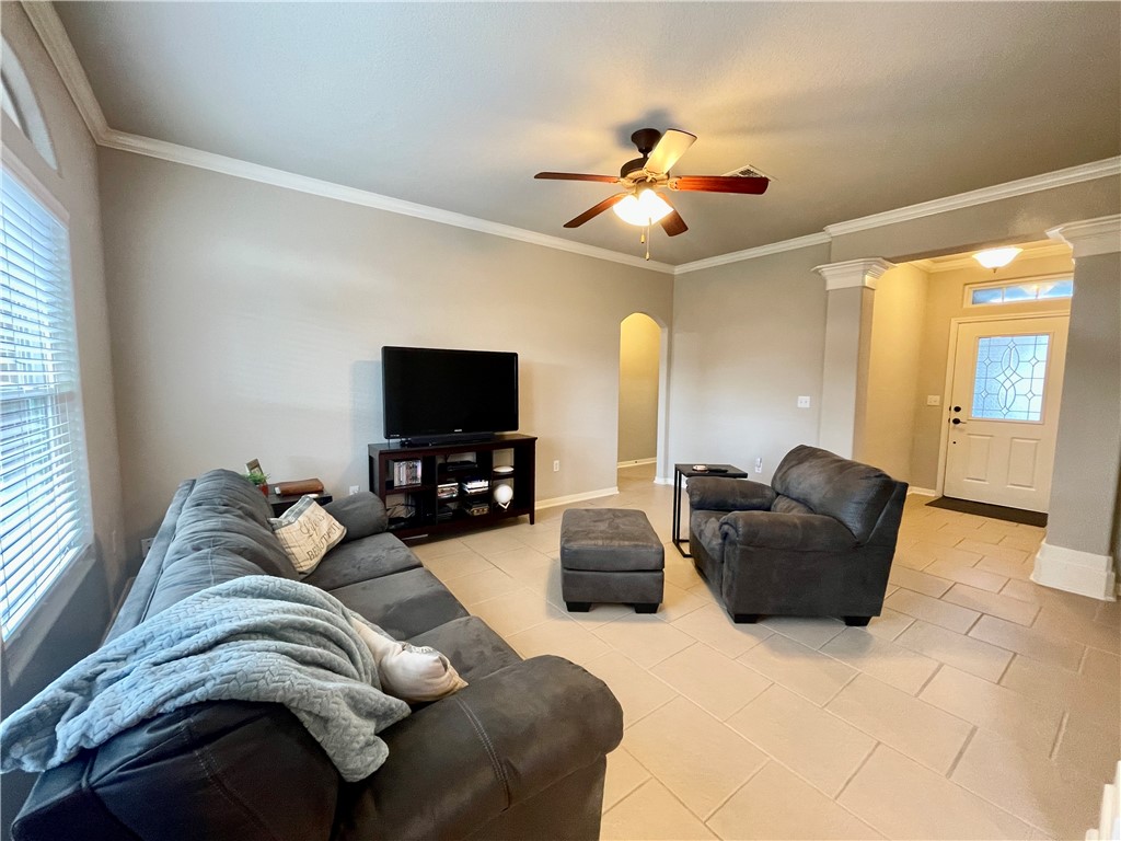 103 Sandollar Circle Fulton, TX 78382 - Photo 6 of 25 a living room with furniture and a flat screen tv