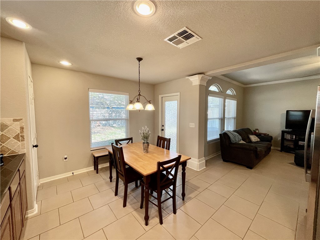 103 Sandollar Circle Fulton, TX 78382 - Photo 10 of 25 a view of a dining room with furniture