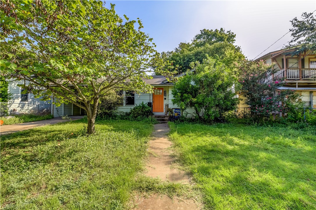 2008 Alegria Road Austin, TX 78757 - Photo 1 of 1 a front view of a house with garden