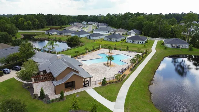 an aerial view of a house with a garden