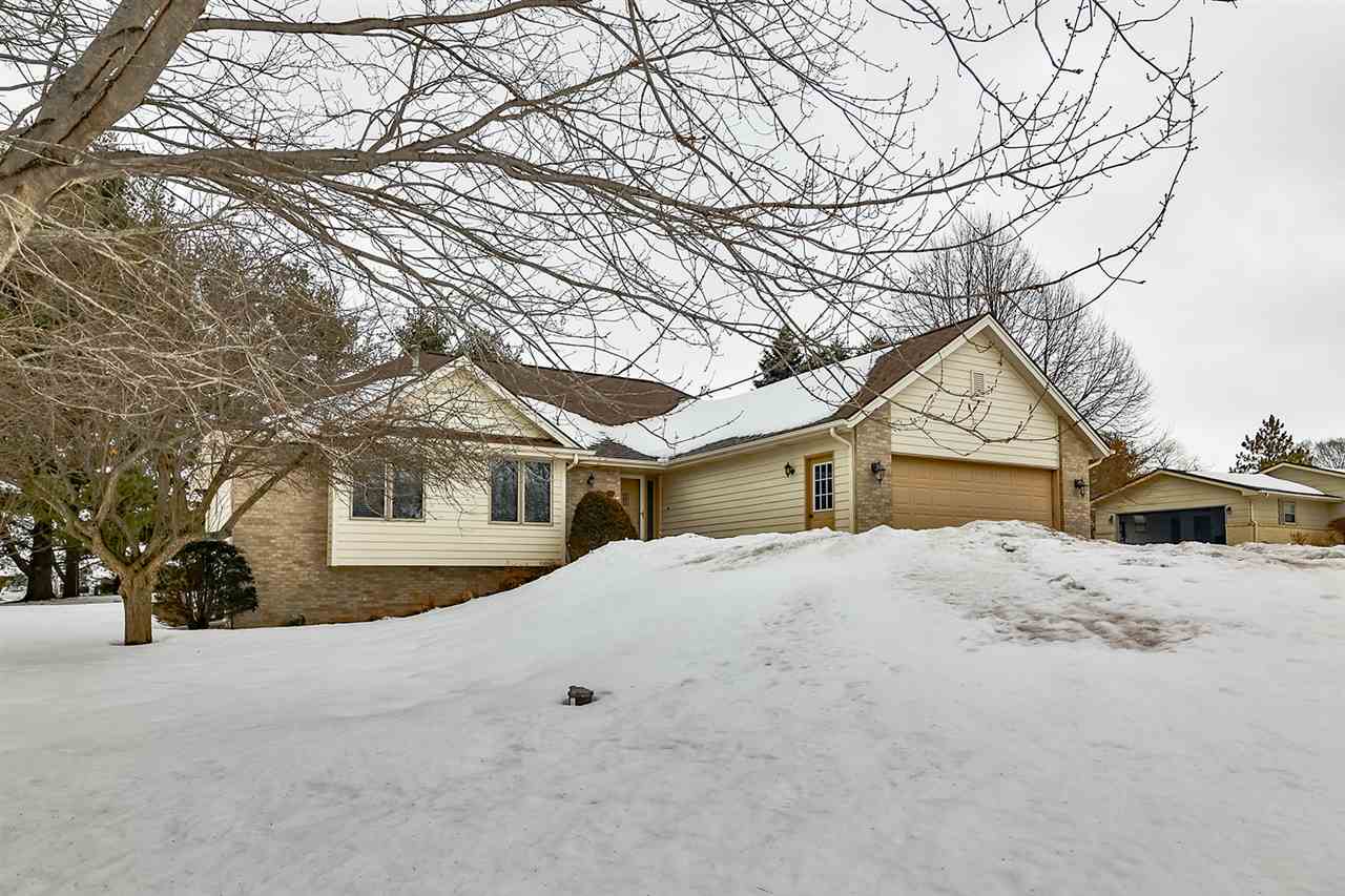 8112 McCurry Road Roscoe, IL 61073 - Photo 1 of 30 a view of house with a snow in front of house