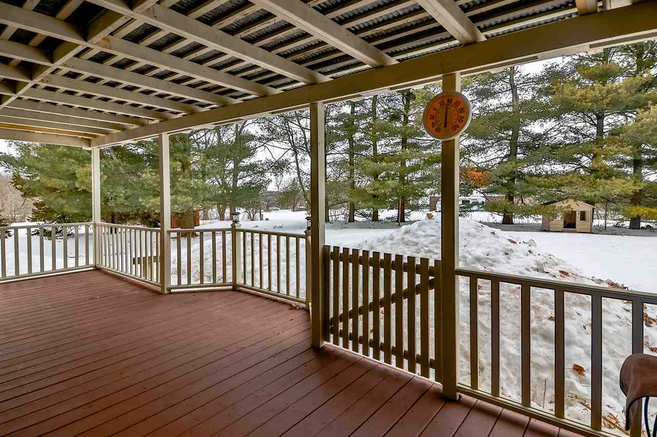 8112 McCurry Road Roscoe, IL 61073 - Photo 6 of 30 a view of a porch